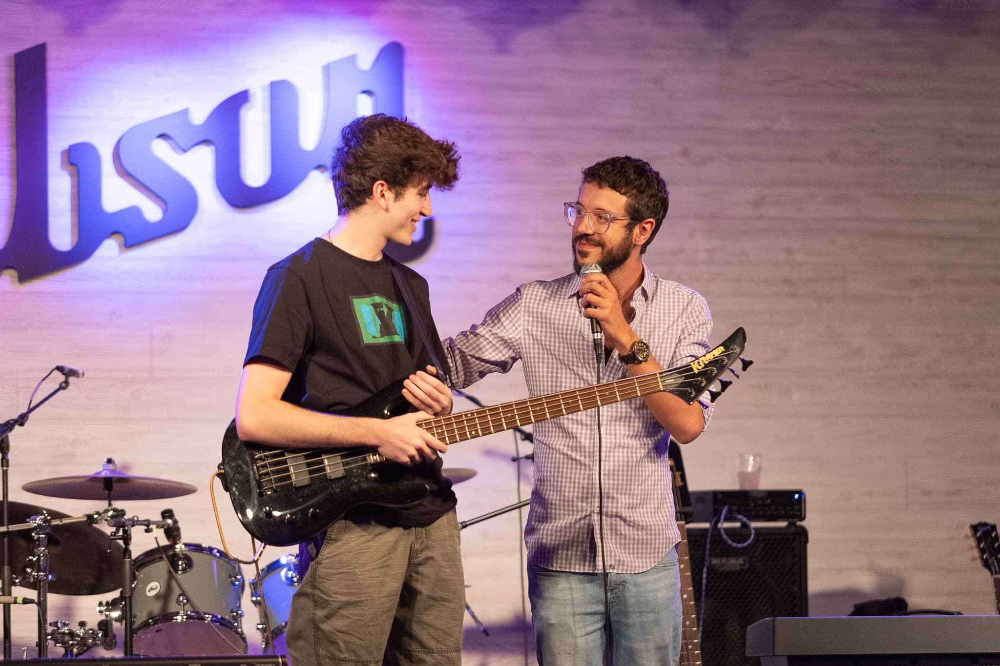 Bass guitar lesson on stage at Wynwood School of Music