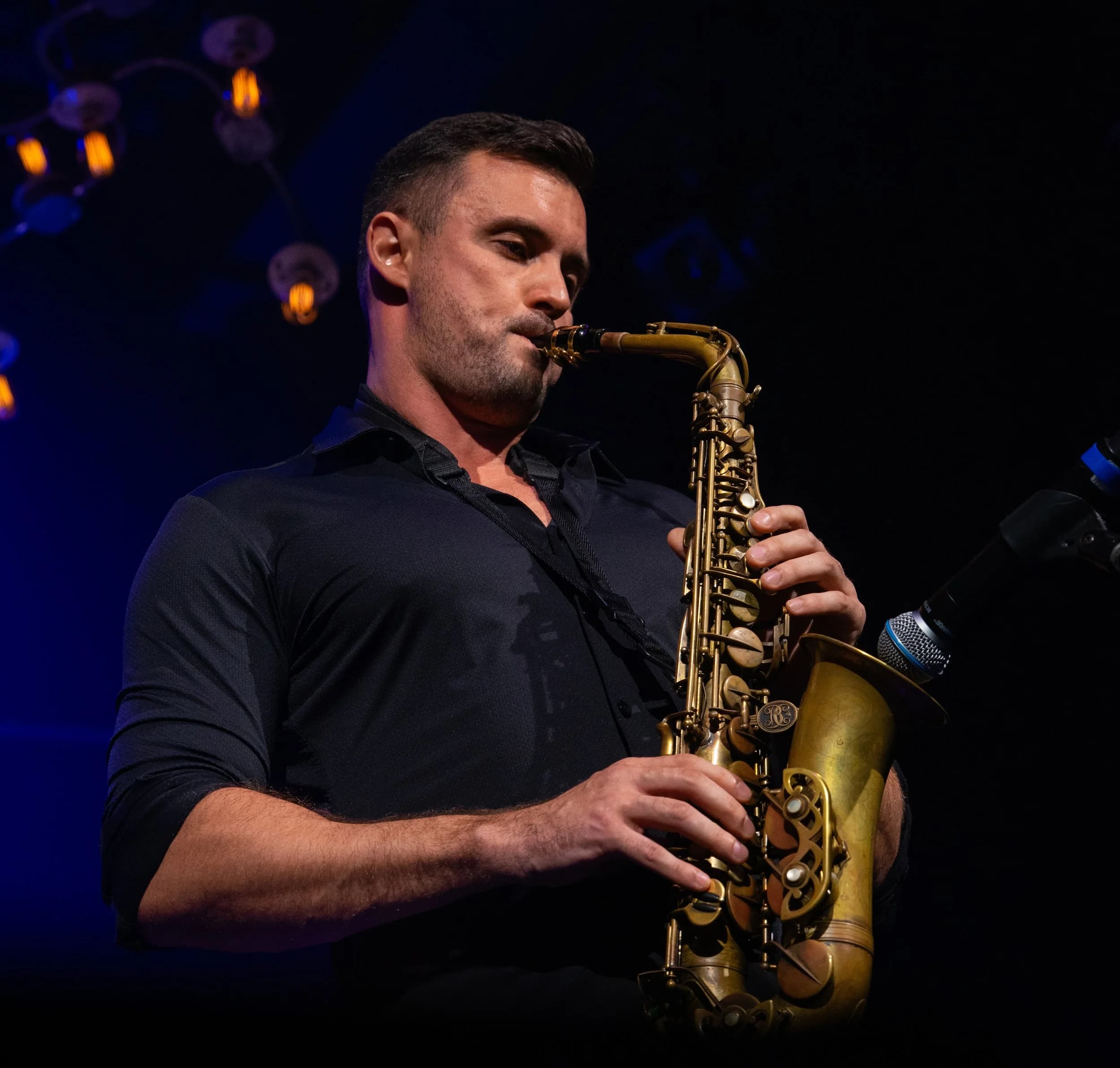 Saxophonist performing at the Wynwood School of Music